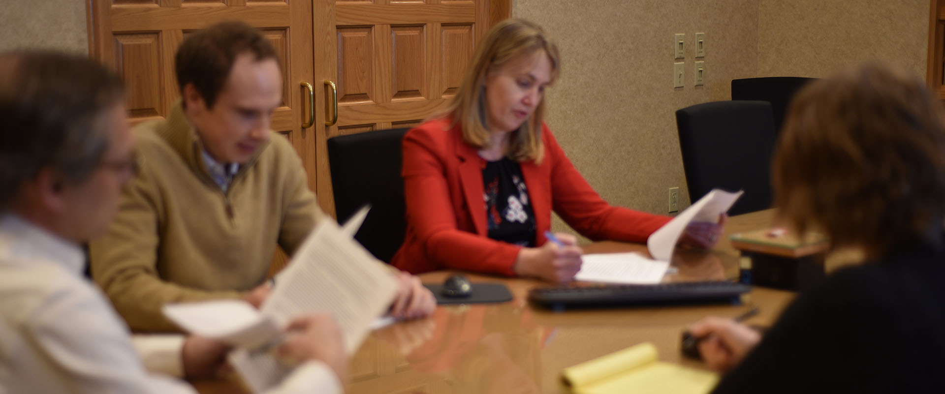 Lawyers from Law Firm of Conway, Olejniczak, and Jerry S.C. meeting around conference room table