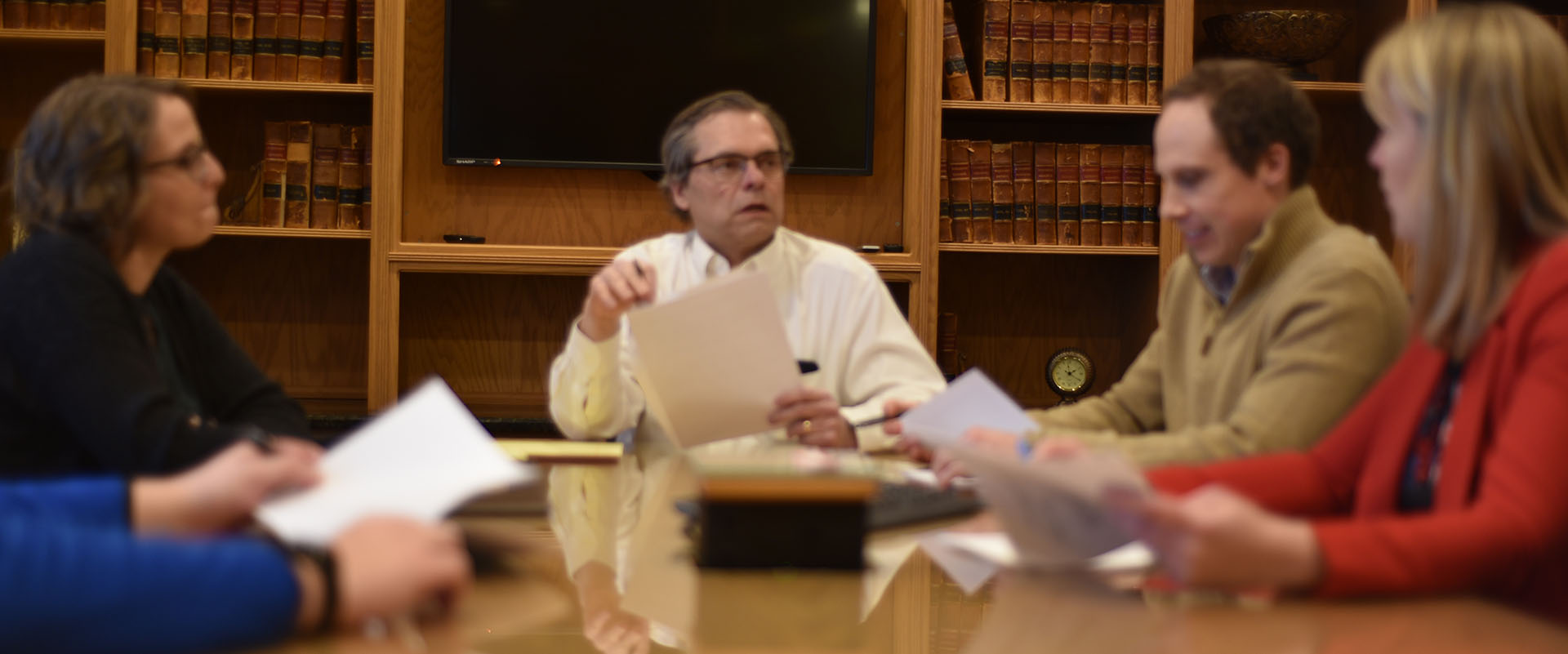 Lawyers from Law Firm of Conway, Olejniczak, and Jerry S.C. meeting around conference room table