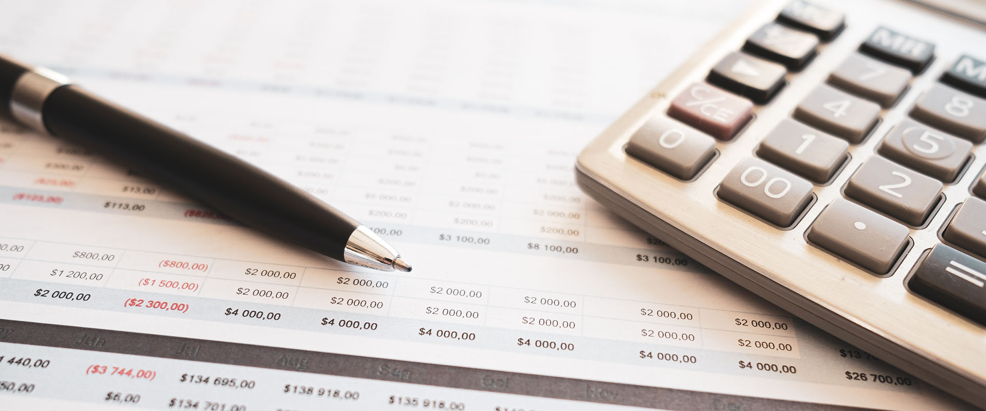 Calculator and spreadsheet on a desk